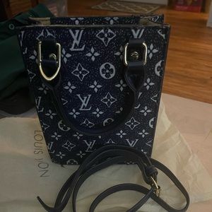 Brand new great quality inspired purse.